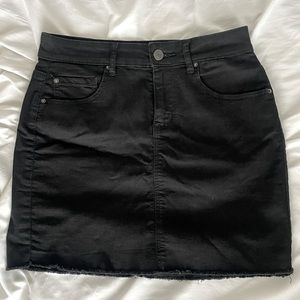 Black denim skirt by Garage